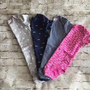 Bundle of Carter’s bodysuits